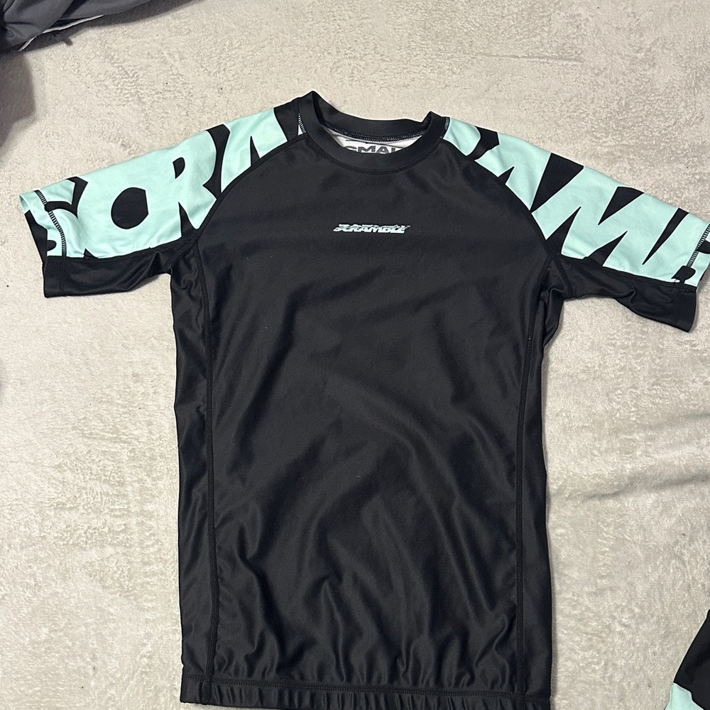 Scramble brand teal and black rash guard
